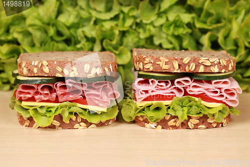 Image of Sandwiches with salami and ham