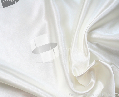 Image of Smooth elegant white silk as background 