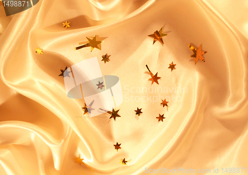 Image of New year holiday golden satin as background 