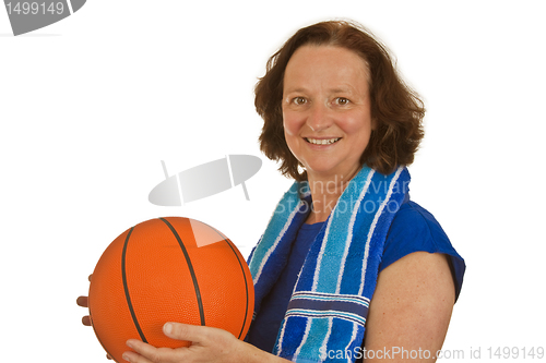 Image of Middle aged woman with basketball 