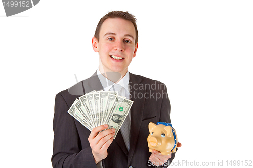 Image of Businessman holding dollar banknotes