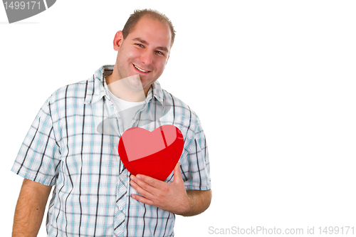 Image of Young man holding red heart