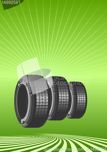 Image of Brand new tires on a green background