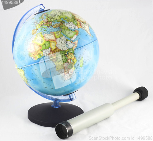 Image of globe and a spyglass