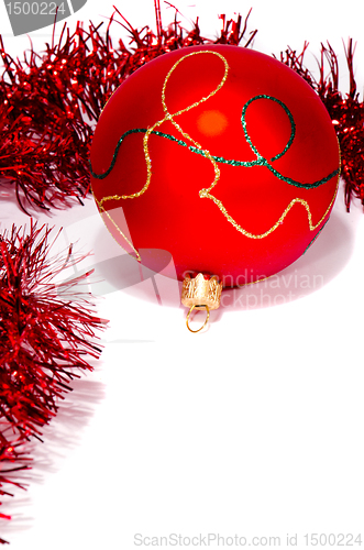 Image of Isolated red christmas toy with glossy ornaments.