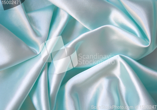 Image of Smooth elegant blue silk as background 
