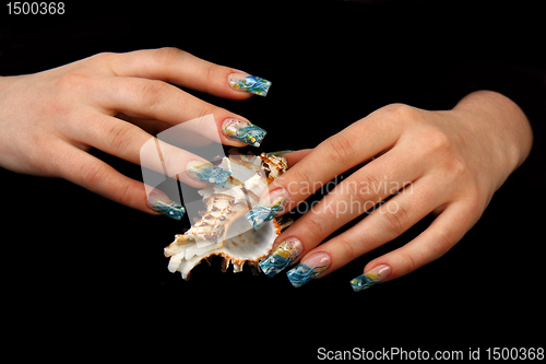 Image of Human fingers with long fingernail and beautiful manicure isolated on black