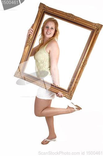 Image of Girl with picture frame.   