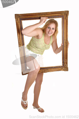 Image of Girl going trough frame.