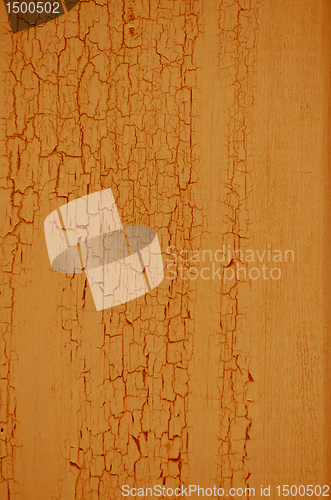 Image of Yellow paint on wood background