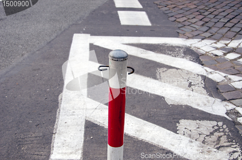 Image of Pole mark forbidden driving zone or road.