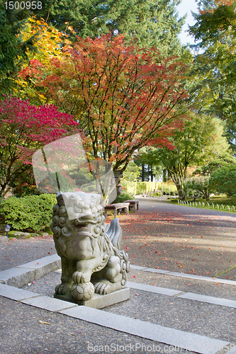 Image of Shishi Lion Protector Stone Statue in Japanese Garden