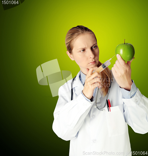 Image of scientist woman with apple