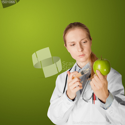 Image of scientist woman with apple