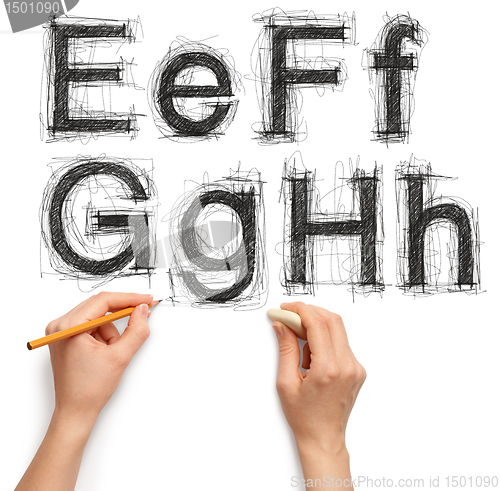 Image of sketch letters and numbers with hand and pencil