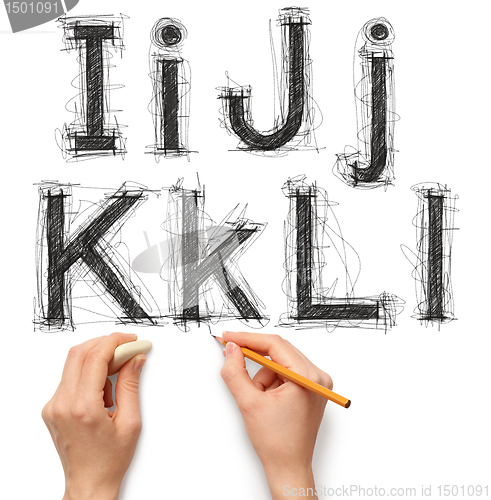 Image of sketch letters and numbers with hand and pencil