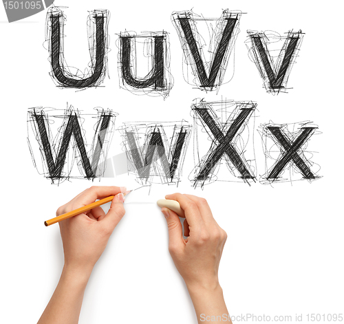 Image of sketch letters and numbers with hand and pencil