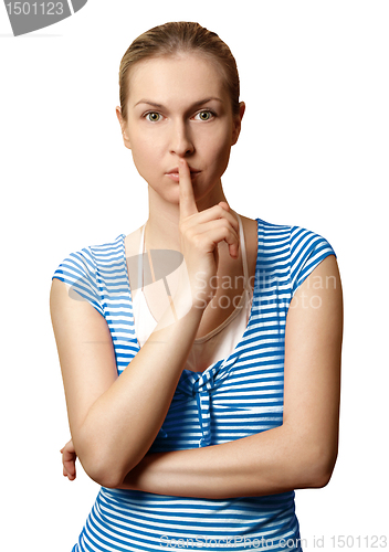 Image of Sporty woman with finger near mouth