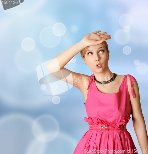 Image of surprised girl in pink