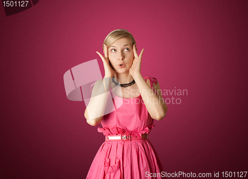 Image of surprised girl in pink