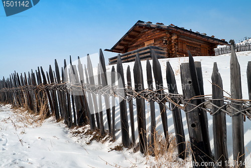 Image of Old winter cottage with fence