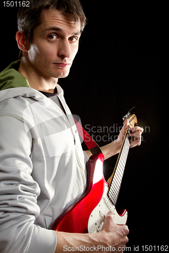 Image of male with guitar