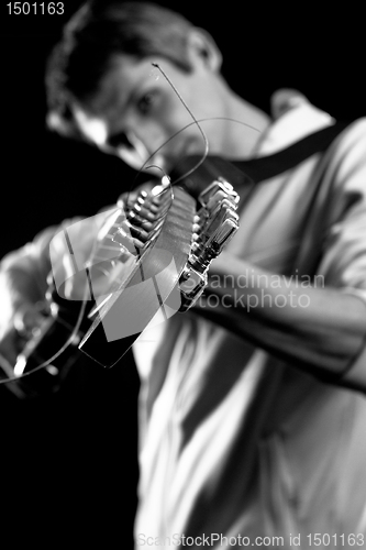 Image of male with guitar