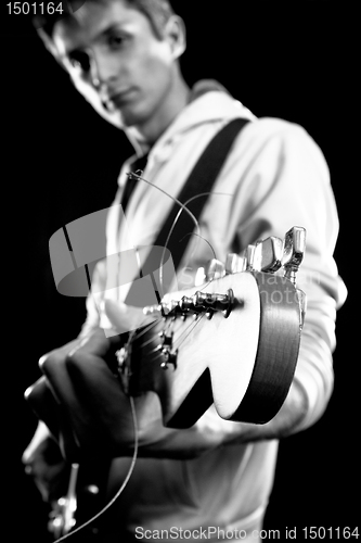 Image of male with guitar