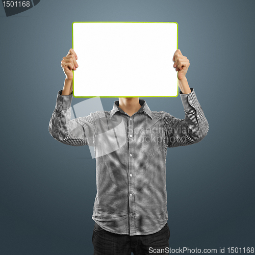 Image of male with write board in his hands