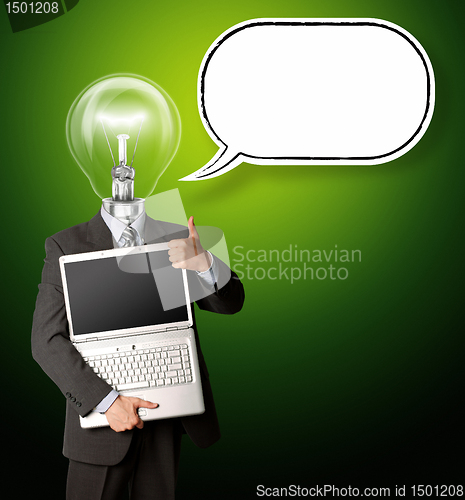 Image of businessman with lamp-head with open laptop and bubble