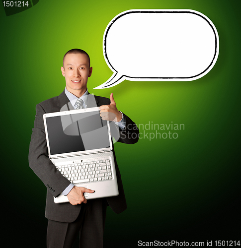 Image of businessman with laptop and thought bubble
