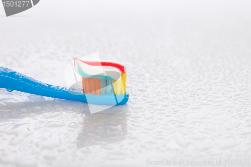 Image of toothbrush and toothpaste