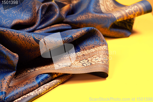 Image of Beautiful fabric with golden lining