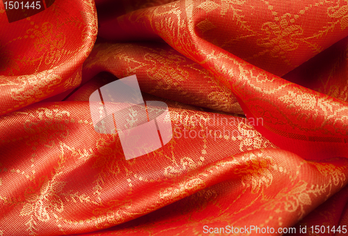 Image of Folded fabric with ornament