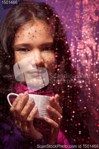 Image of Cold rainy weather and cup of hot tea