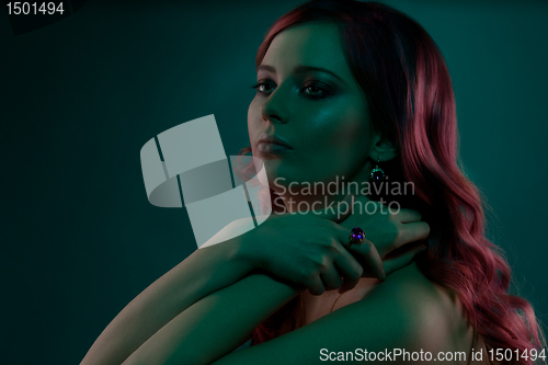 Image of Beauty on dark green