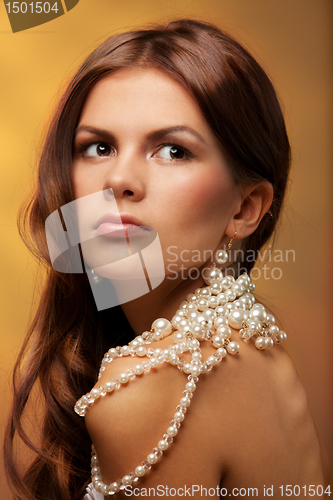 Image of Girl with pearls necklace