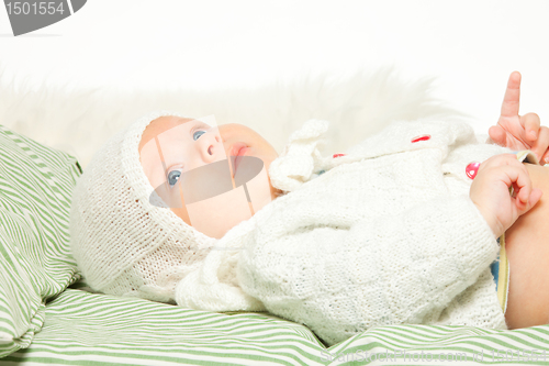 Image of Little adorable baby in the bed