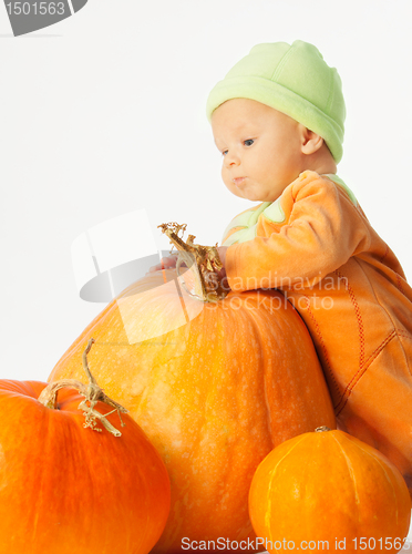 Image of Baby and Halloween pumpkins