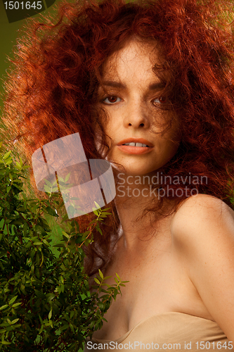 Image of Beautiful red curly hair girl