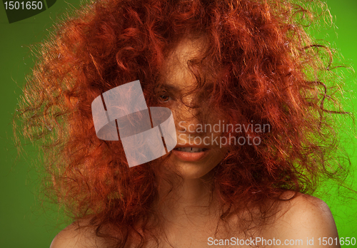 Image of Red curly hair woman beauty portrait