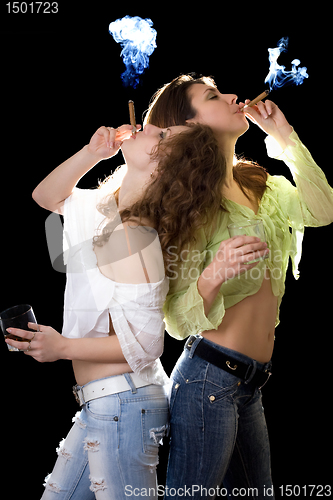 Image of Two girlfriends with a glass of brandy and cigars
