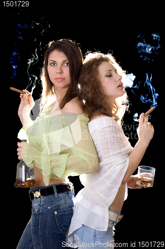 Image of Portrait of the two girlfriends with a cigars