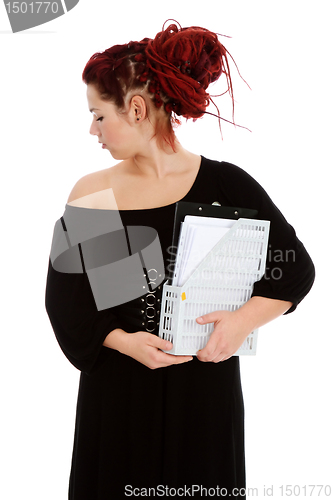 Image of Young woman with folder of documents