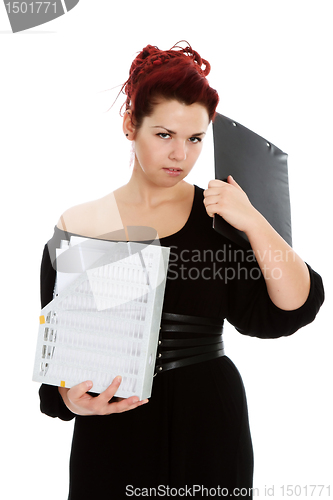 Image of Young woman with folder of documents