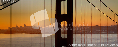 Image of Sunrise over San Francisco Bay through Golden Gate Bridge