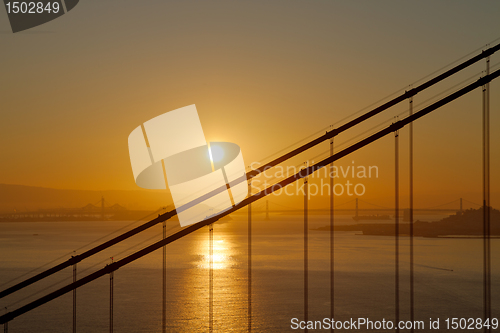 Image of Sunrise over Golden Gate and Oakland Bay Bridge