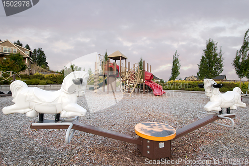 Image of Neighborhood Public Park Children's Playground with Seesaw