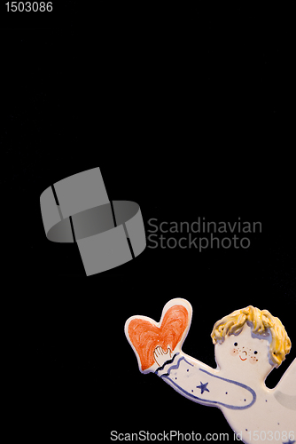 Image of Boy carrying heart 