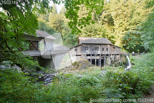 Image of Covered Bridge and Grist Mill Over Cedar Creek